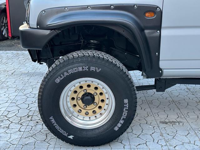 ジムニー XC 【1年間走行無制限保証】/フルカスタム車両(エアロ・マフラー・スキッドプレート・リフトアップ・ブリスターフェンダー・LEDテール・シートカバー・アルミホイール)/Bluetoothオーディオ付社外ナビ(62枚目)