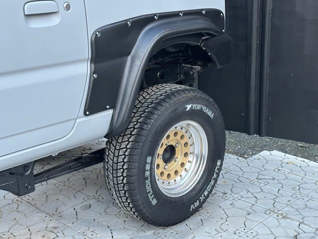 ジムニー XC 【1年間走行無制限保証】/フルカスタム車両(エアロ・マフラー・スキッドプレート・リフトアップ・ブリスターフェンダー・LEDテール・シートカバー・アルミホイール)/Bluetoothオーディオ付社外ナビ(64枚目)
