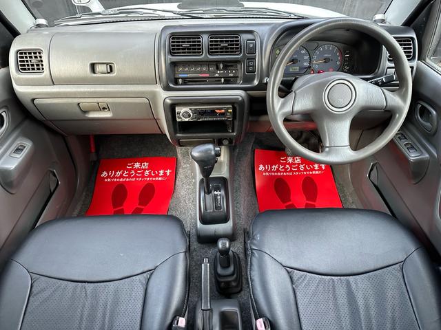 ジムニー XC 【1年間走行無制限保証】/フルカスタム車両(エアロ・マフラー・スキッドプレート・リフトアップ・ブリスターフェンダー・LEDテール・シートカバー・アルミホイール)/Bluetoothオーディオ付社外ナビ(65枚目)