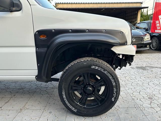 ジムニー ＸＣ　【１年間走行無制限保証】／フルカスタム車両（改バンパー・リフトアップ・ブリスターフェンダー・ＬＥＤテール・ヘッドライトカバー・オールテレーンＧＥＯＬＡＮＤＡＲ　Ａ／Ｔ－Ｓ）／ＢＴオーディオ／ＥＴＣ（16枚目）