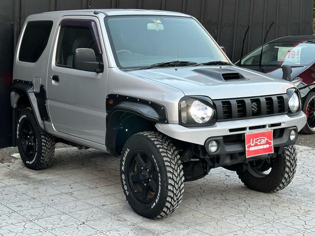 ジムニー XG 【1年間走行無制限保証】/フルカスタム車両(改バンパー・リフトアップ・ブリスターフェンダー・16インチ(BLOWS)・ヘッドライトカバー・LEDテール・マッドテレーン(TOYO TRANPATH)(13枚目)