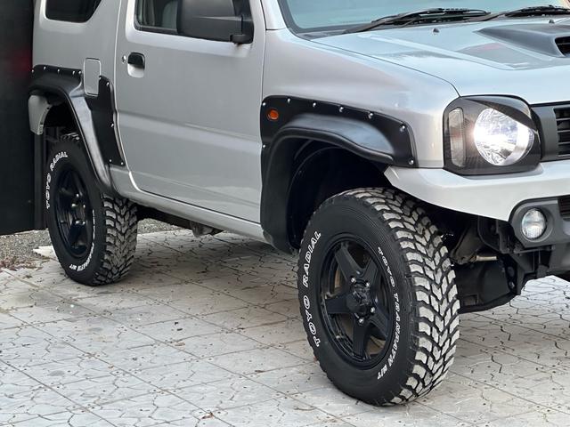 ジムニー XG 【1年間走行無制限保証】/フルカスタム車両(改バンパー・リフトアップ・ブリスターフェンダー・16インチ(BLOWS)・ヘッドライトカバー・LEDテール・マッドテレーン(TOYO TRANPATH)(19枚目)