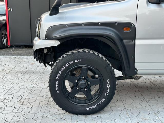 ジムニー XG 【1年間走行無制限保証】/フルカスタム車両(改バンパー・リフトアップ・ブリスターフェンダー・16インチ(BLOWS)・ヘッドライトカバー・LEDテール・マッドテレーン(TOYO TRANPATH)(46枚目)