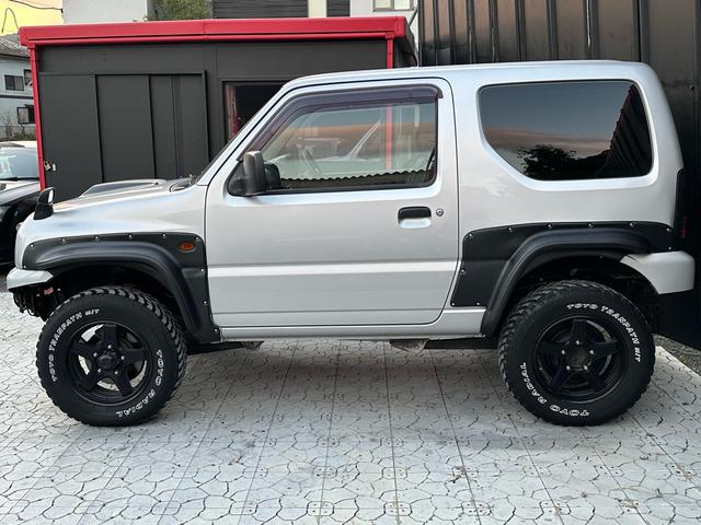 ジムニー XG 【1年間走行無制限保証】/フルカスタム車両(改バンパー・リフトアップ・ブリスターフェンダー・16インチ(BLOWS)・ヘッドライトカバー・LEDテール・マッドテレーン(TOYO TRANPATH)(47枚目)