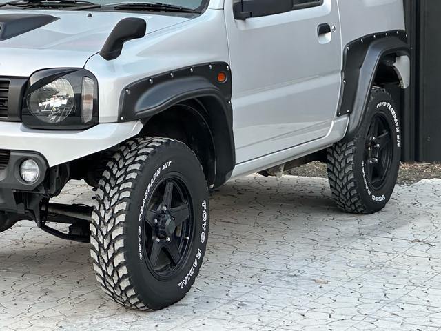 ジムニー XG 【1年間走行無制限保証】/フルカスタム車両(改バンパー・リフトアップ・ブリスターフェンダー・16インチ(BLOWS)・ヘッドライトカバー・LEDテール・マッドテレーン(TOYO TRANPATH)(48枚目)