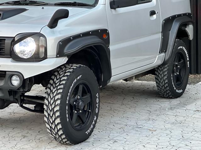 ジムニー XG 【1年間走行無制限保証】/フルカスタム車両(改バンパー・リフトアップ・ブリスターフェンダー・16インチ(BLOWS)・ヘッドライトカバー・LEDテール・マッドテレーン(TOYO TRANPATH)(49枚目)