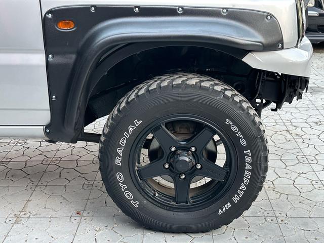 ジムニー XG 【1年間走行無制限保証】/フルカスタム車両(改バンパー・リフトアップ・ブリスターフェンダー・16インチ(BLOWS)・ヘッドライトカバー・LEDテール・マッドテレーン(TOYO TRANPATH)(58枚目)