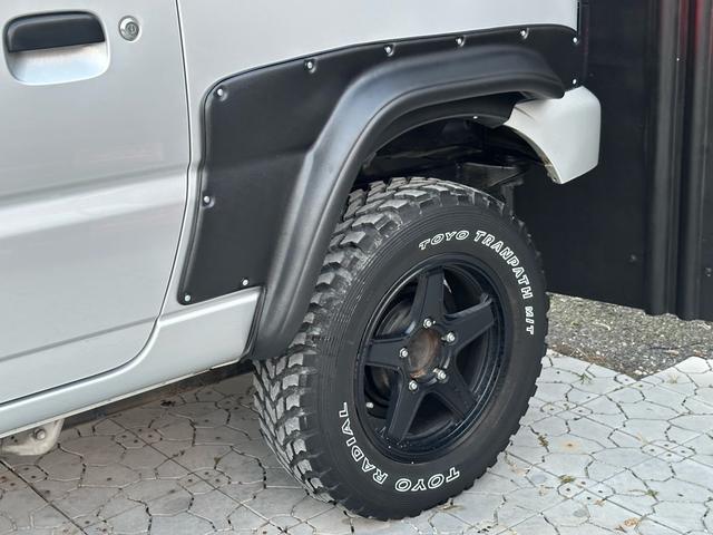 ジムニー XG 【1年間走行無制限保証】/フルカスタム車両(改バンパー・リフトアップ・ブリスターフェンダー・16インチ(BLOWS)・ヘッドライトカバー・LEDテール・マッドテレーン(TOYO TRANPATH)(59枚目)