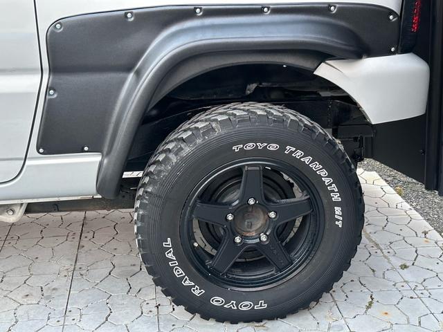 ジムニー XG 【1年間走行無制限保証】/フルカスタム車両(改バンパー・リフトアップ・ブリスターフェンダー・16インチ(BLOWS)・ヘッドライトカバー・LEDテール・マッドテレーン(TOYO TRANPATH)(60枚目)