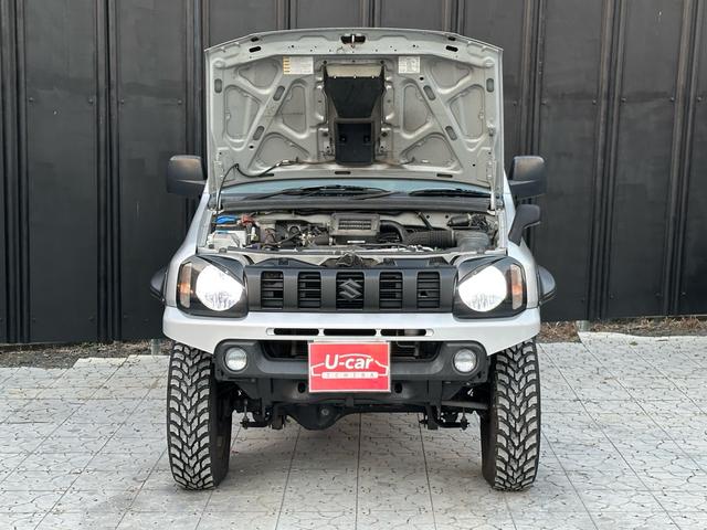 ジムニー XG 【1年間走行無制限保証】/フルカスタム車両(改バンパー・リフトアップ・ブリスターフェンダー・16インチ(BLOWS)・ヘッドライトカバー・LEDテール・マッドテレーン(TOYO TRANPATH)(62枚目)