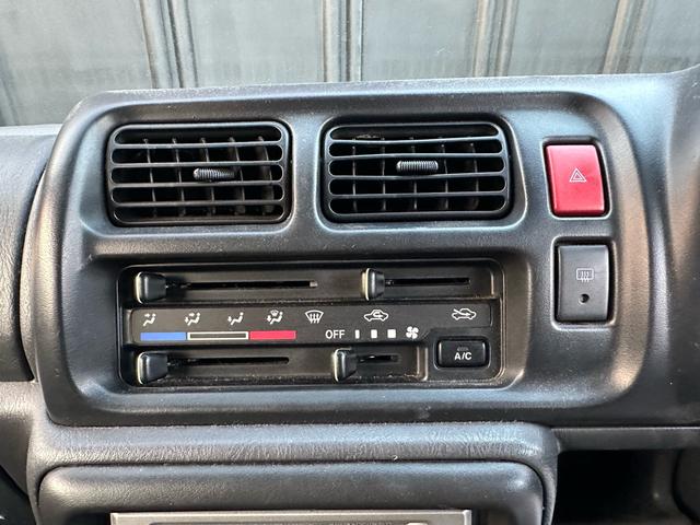 ジムニー XG 【1年間走行無制限保証】/フルカスタム車両(改バンパー・リフトアップ・ブリスターフェンダー・16インチ(BLOWS)・ヘッドライトカバー・LEDテール・マッドテレーン(TOYO TRANPATH)(69枚目)