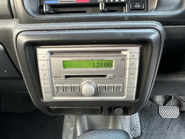 ジムニー XG 【1年間走行無制限保証】/フルカスタム車両(改バンパー・リフトアップ・ブリスターフェンダー・16インチ(BLOWS)・ヘッドライトカバー・LEDテール・マッドテレーン(TOYO TRANPATH)(70枚目)