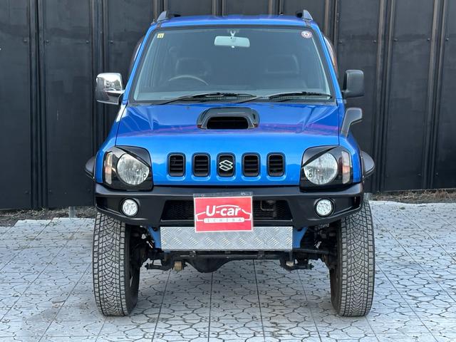 ジムニー XC 【1年間走行無制限保証】5MT/フルカスタム車両(エアロ・2本出しマフラー・スキッドプレート・リフトアップ・ブリスターフェンダー・LEDテール・シートカバー・アルミホイール・ヘッドライトカバー)(10枚目)