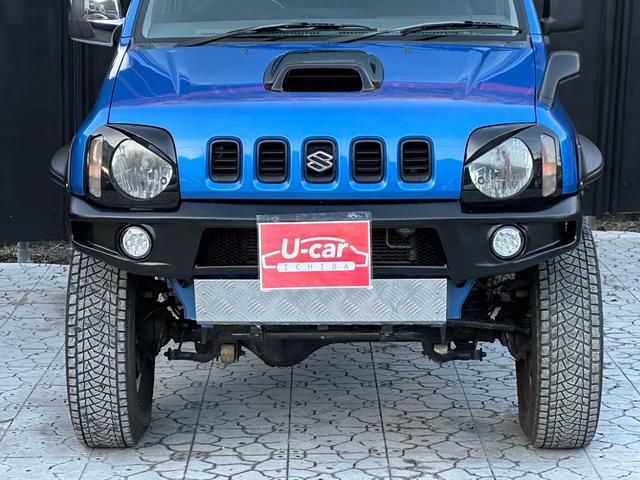 ジムニー XC 【1年間走行無制限保証】5MT/フルカスタム車両(エアロ・2本出しマフラー・スキッドプレート・リフトアップ・ブリスターフェンダー・LEDテール・シートカバー・アルミホイール・ヘッドライトカバー)(12枚目)