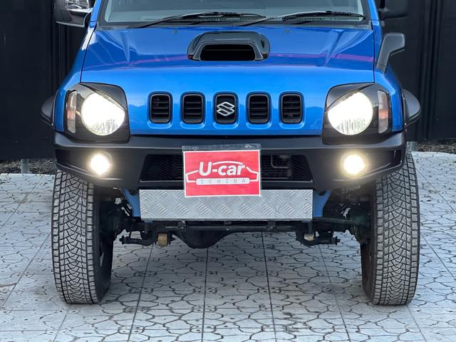 ジムニー XC 【1年間走行無制限保証】5MT/フルカスタム車両(エアロ・2本出しマフラー・スキッドプレート・リフトアップ・ブリスターフェンダー・LEDテール・シートカバー・アルミホイール・ヘッドライトカバー)(13枚目)