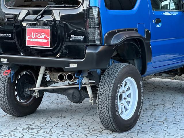 ジムニー XC 【1年間走行無制限保証】5MT/フルカスタム車両(エアロ・2本出しマフラー・スキッドプレート・リフトアップ・ブリスターフェンダー・LEDテール・シートカバー・アルミホイール・ヘッドライトカバー)(27枚目)