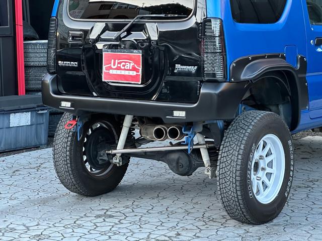 ジムニー XC 【1年間走行無制限保証】5MT/フルカスタム車両(エアロ・2本出しマフラー・スキッドプレート・リフトアップ・ブリスターフェンダー・LEDテール・シートカバー・アルミホイール・ヘッドライトカバー)(29枚目)