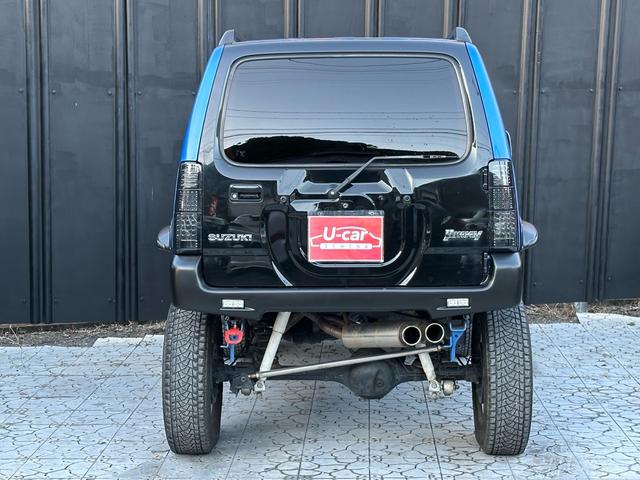 ジムニー XC 【1年間走行無制限保証】5MT/フルカスタム車両(エアロ・2本出しマフラー・スキッドプレート・リフトアップ・ブリスターフェンダー・LEDテール・シートカバー・アルミホイール・ヘッドライトカバー)(33枚目)