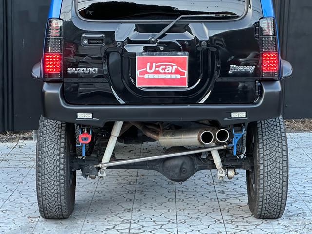ジムニー XC 【1年間走行無制限保証】5MT/フルカスタム車両(エアロ・2本出しマフラー・スキッドプレート・リフトアップ・ブリスターフェンダー・LEDテール・シートカバー・アルミホイール・ヘッドライトカバー)(36枚目)