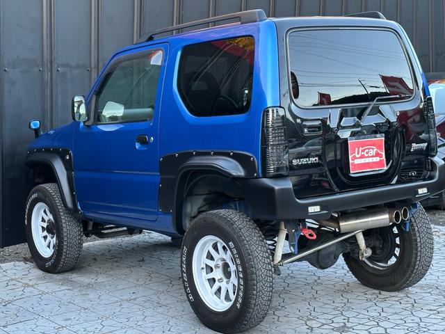 ジムニー XC 【1年間走行無制限保証】5MT/フルカスタム車両(エアロ・2本出しマフラー・スキッドプレート・リフトアップ・ブリスターフェンダー・LEDテール・シートカバー・アルミホイール・ヘッドライトカバー)(38枚目)