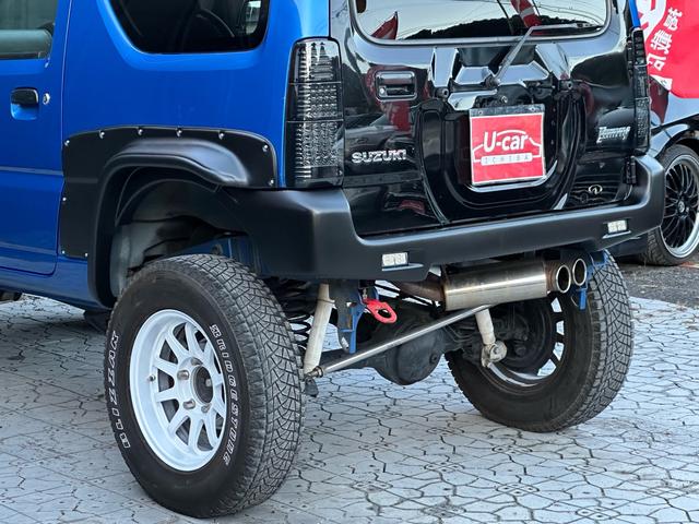 ジムニー XC 【1年間走行無制限保証】5MT/フルカスタム車両(エアロ・2本出しマフラー・スキッドプレート・リフトアップ・ブリスターフェンダー・LEDテール・シートカバー・アルミホイール・ヘッドライトカバー)(40枚目)