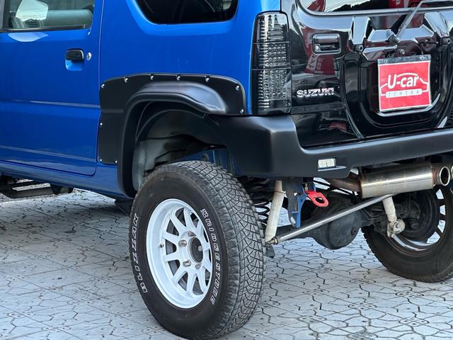 ジムニー XC 【1年間走行無制限保証】5MT/フルカスタム車両(エアロ・2本出しマフラー・スキッドプレート・リフトアップ・ブリスターフェンダー・LEDテール・シートカバー・アルミホイール・ヘッドライトカバー)(42枚目)