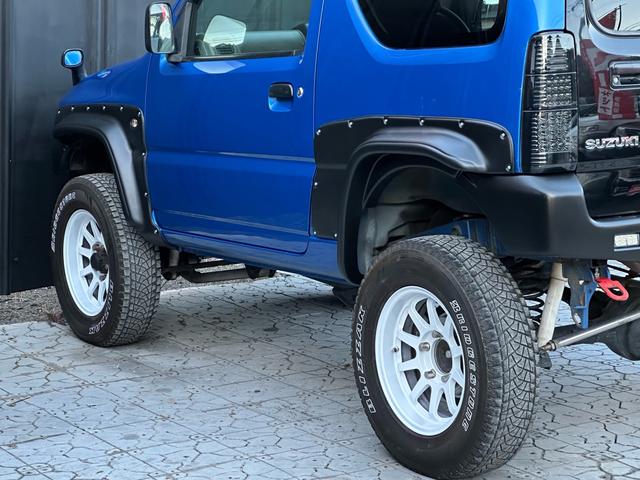 ジムニー XC 【1年間走行無制限保証】5MT/フルカスタム車両(エアロ・2本出しマフラー・スキッドプレート・リフトアップ・ブリスターフェンダー・LEDテール・シートカバー・アルミホイール・ヘッドライトカバー)(44枚目)
