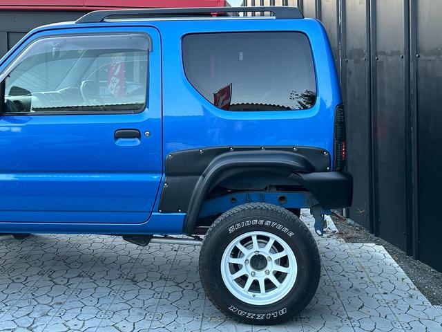 ジムニー XC 【1年間走行無制限保証】5MT/フルカスタム車両(エアロ・2本出しマフラー・スキッドプレート・リフトアップ・ブリスターフェンダー・LEDテール・シートカバー・アルミホイール・ヘッドライトカバー)(47枚目)