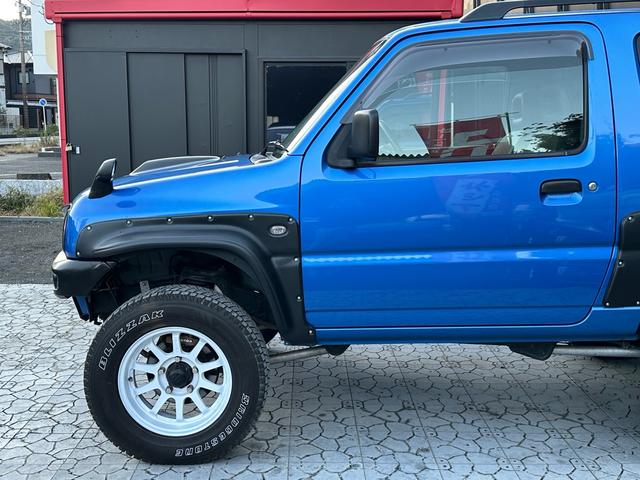 ジムニー XC 【1年間走行無制限保証】5MT/フルカスタム車両(エアロ・2本出しマフラー・スキッドプレート・リフトアップ・ブリスターフェンダー・LEDテール・シートカバー・アルミホイール・ヘッドライトカバー)(48枚目)