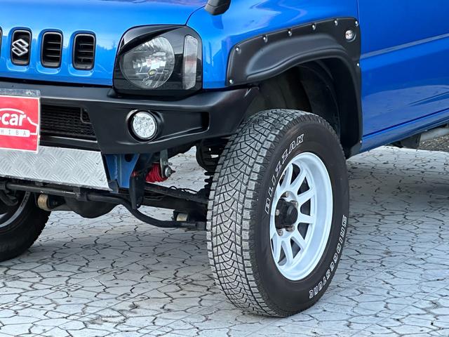 ジムニー XC 【1年間走行無制限保証】5MT/フルカスタム車両(エアロ・2本出しマフラー・スキッドプレート・リフトアップ・ブリスターフェンダー・LEDテール・シートカバー・アルミホイール・ヘッドライトカバー)(53枚目)