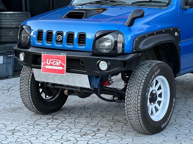 ジムニー XC 【1年間走行無制限保証】5MT/フルカスタム車両(エアロ・2本出しマフラー・スキッドプレート・リフトアップ・ブリスターフェンダー・LEDテール・シートカバー・アルミホイール・ヘッドライトカバー)(55枚目)