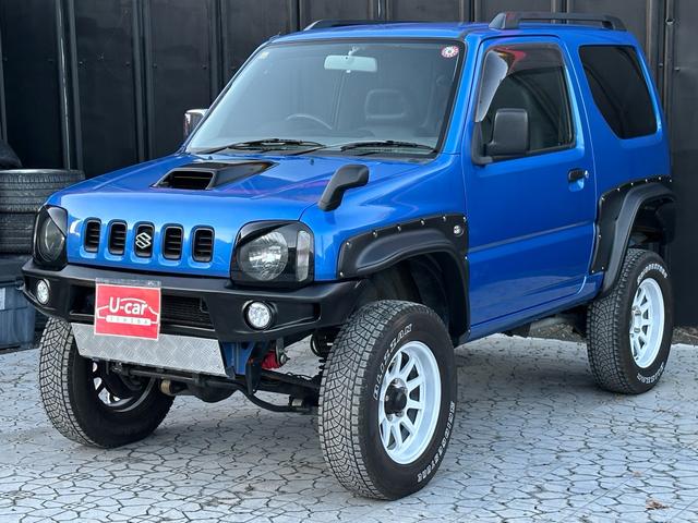 ジムニー XC 【1年間走行無制限保証】5MT/フルカスタム車両(エアロ・2本出しマフラー・スキッドプレート・リフトアップ・ブリスターフェンダー・LEDテール・シートカバー・アルミホイール・ヘッドライトカバー)(57枚目)
