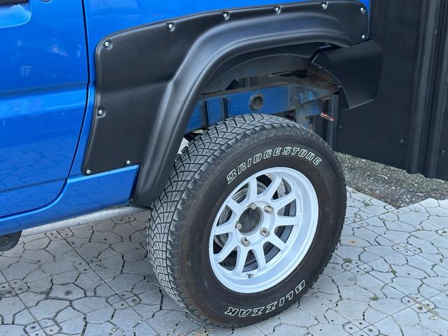 ジムニー XC 【1年間走行無制限保証】5MT/フルカスタム車両(エアロ・2本出しマフラー・スキッドプレート・リフトアップ・ブリスターフェンダー・LEDテール・シートカバー・アルミホイール・ヘッドライトカバー)(61枚目)