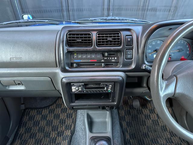 ジムニー XC 【1年間走行無制限保証】5MT/フルカスタム車両(エアロ・2本出しマフラー・スキッドプレート・リフトアップ・ブリスターフェンダー・LEDテール・シートカバー・アルミホイール・ヘッドライトカバー)(65枚目)