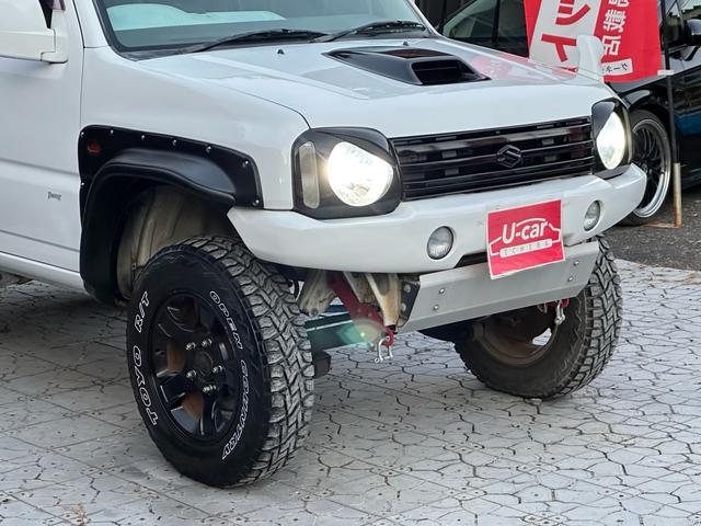 ジムニー Ｊ２　【１年間走行無制限保証】／ＴＡＮＩＧＵＣＨＩコンプリート車両（エアロ・マフラー・スキッドプレート・リフトアップ）／ブリスターフェンダー／ＬＥＤテール／１６インチ／ラギッドテレーン（ＴＯＹＯ）（15枚目）