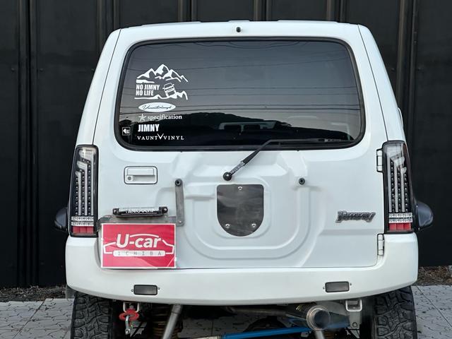 ジムニー Ｊ２　【１年間走行無制限保証】／ＴＡＮＩＧＵＣＨＩコンプリート車両（エアロ・マフラー・スキッドプレート・リフトアップ）／ブリスターフェンダー／ＬＥＤテール／１６インチ／ラギッドテレーン（ＴＯＹＯ）（35枚目）