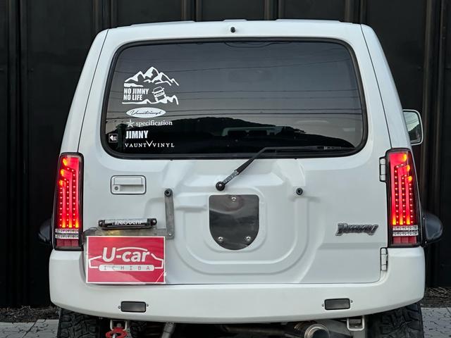 ジムニー Ｊ２　【１年間走行無制限保証】／ＴＡＮＩＧＵＣＨＩコンプリート車両（エアロ・マフラー・スキッドプレート・リフトアップ）／ブリスターフェンダー／ＬＥＤテール／１６インチ／ラギッドテレーン（ＴＯＹＯ）（36枚目）
