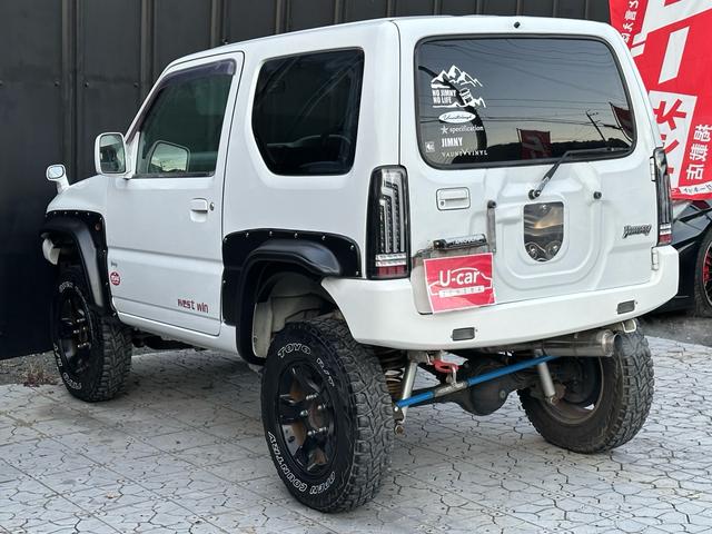 ジムニー Ｊ２　【１年間走行無制限保証】／ＴＡＮＩＧＵＣＨＩコンプリート車両（エアロ・マフラー・スキッドプレート・リフトアップ）／ブリスターフェンダー／ＬＥＤテール／１６インチ／ラギッドテレーン（ＴＯＹＯ）（39枚目）