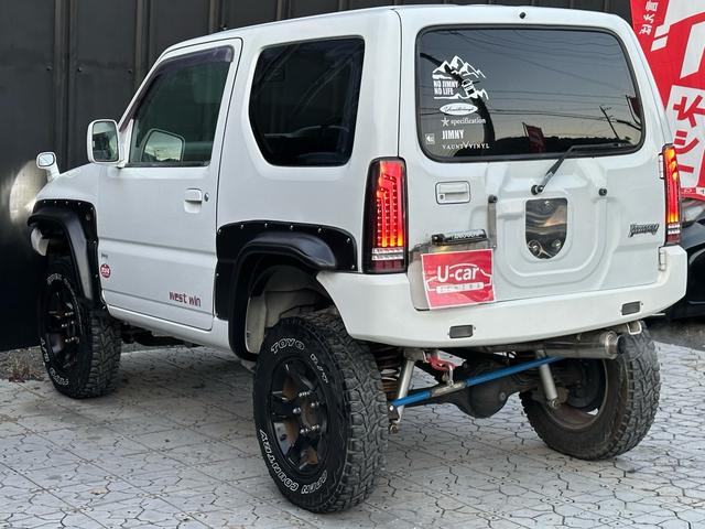 ジムニー Ｊ２　【１年間走行無制限保証】／ＴＡＮＩＧＵＣＨＩコンプリート車両（エアロ・マフラー・スキッドプレート・リフトアップ）／ブリスターフェンダー／ＬＥＤテール／１６インチ／ラギッドテレーン（ＴＯＹＯ）（40枚目）