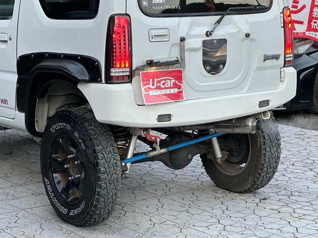 ジムニー Ｊ２　【１年間走行無制限保証】／ＴＡＮＩＧＵＣＨＩコンプリート車両（エアロ・マフラー・スキッドプレート・リフトアップ）／ブリスターフェンダー／ＬＥＤテール／１６インチ／ラギッドテレーン（ＴＯＹＯ）（42枚目）