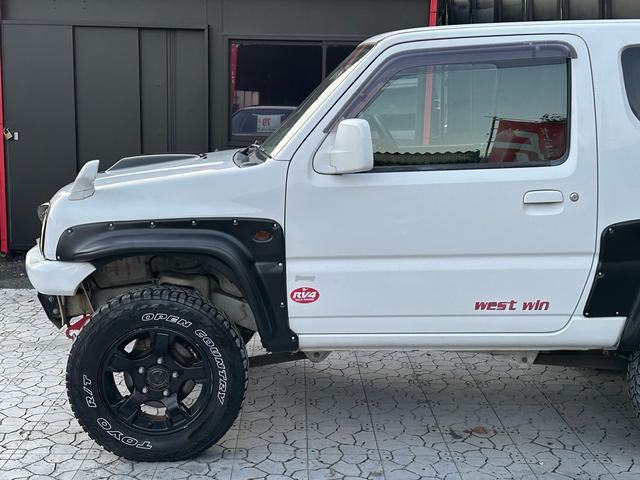 ジムニー Ｊ２　【１年間走行無制限保証】／ＴＡＮＩＧＵＣＨＩコンプリート車両（エアロ・マフラー・スキッドプレート・リフトアップ）／ブリスターフェンダー／ＬＥＤテール／１６インチ／ラギッドテレーン（ＴＯＹＯ）（49枚目）