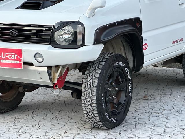 ジムニー Ｊ２　【１年間走行無制限保証】／ＴＡＮＩＧＵＣＨＩコンプリート車両（エアロ・マフラー・スキッドプレート・リフトアップ）／ブリスターフェンダー／ＬＥＤテール／１６インチ／ラギッドテレーン（ＴＯＹＯ）（53枚目）