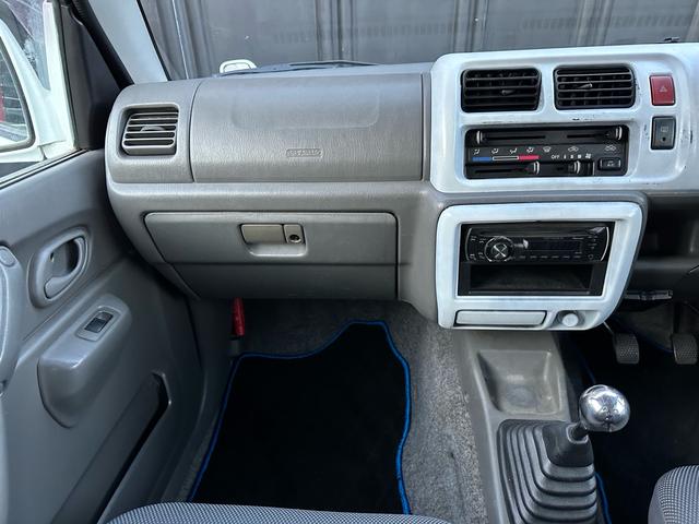 ジムニー Ｊ２　【１年間走行無制限保証】／ＴＡＮＩＧＵＣＨＩコンプリート車両（エアロ・マフラー・スキッドプレート・リフトアップ）／ブリスターフェンダー／ＬＥＤテール／１６インチ／ラギッドテレーン（ＴＯＹＯ）（67枚目）