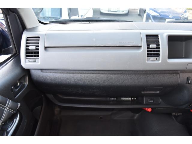 レジアスエースバン スーパーロングワイドＤＸ　ＧＬパック　３．０Ｌディーゼルターボ　リアクーラー・リアヒーター付き　純正ナビ（走行中ＴＶ視聴可！）　車検対応社外１７インチアルミホイール（ブラックダイアモンド）＆ホワイトレタータイヤのナスカープラス！（34枚目）