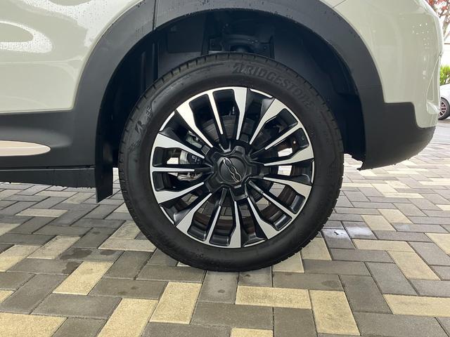 ５００Ｘ ブレッザ　１００台限定車　電動開閉式ベージュソフトトップ　純正ディスプレーオーディオ　バックカメラ　ＥＴＣ（10枚目）