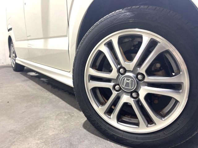 Ｎ－ＢＯＸカスタム Ｇ・ＬパッケージＳＳパッケージ　両側電動ドア　純正ＨＤＤナビ　バックカメラ　衝突被害軽減システム　禁煙車　スマートキー　ＨＩＤヘッド　ＥＴＣ　純正１４インチアルミ　オートエアコン　Ｂｌｕｅｔｏｏｔｈ　ＣＤ　ＤＶＤ再生　フルセグ（13枚目）