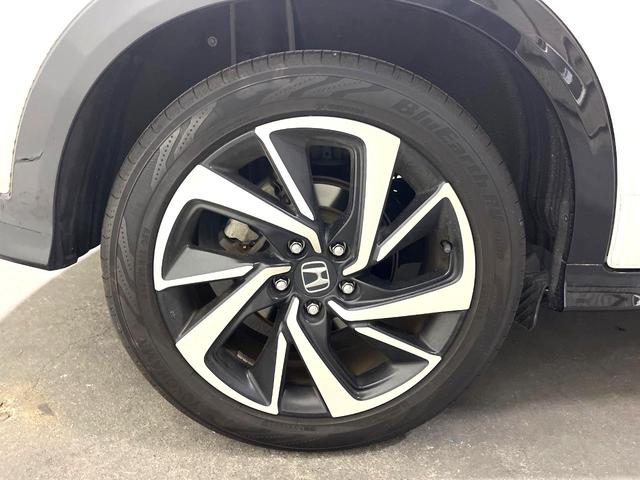 ヴェゼル ハイブリッドＲＳ・ホンダセンシング　バックカメラ　禁煙車　衝突被害軽減システム　ハーフレザーシート　スマートキー　ＬＥＤヘッド　ビルトインＥＴＣ　純正１８インチアルミ　オートライト　デュアルエアコン　Ｂｌｕｅｔｏｏｔｈ　ＣＤ　ＤＶＤ再生（26枚目）