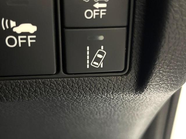 ヴェゼル ハイブリッドＲＳ・ホンダセンシング　バックカメラ　禁煙車　衝突被害軽減システム　ハーフレザーシート　スマートキー　ＬＥＤヘッド　ビルトインＥＴＣ　純正１８インチアルミ　オートライト　デュアルエアコン　Ｂｌｕｅｔｏｏｔｈ　ＣＤ　ＤＶＤ再生（30枚目）