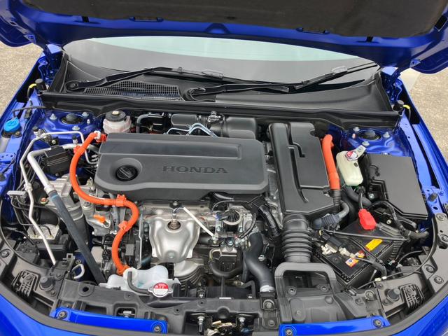 シビック ｅ：ＨＥＶ　純正ナビ地デジバックカメラホンダセンシングハーフレザーパワーシートアダプティブクルーズコントロールシートヒーターパドルシフトＰセンサー（18枚目）