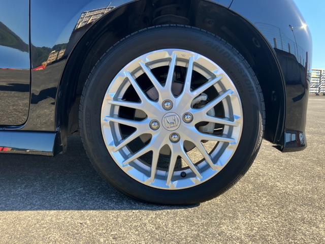 N-BOXカスタム Lターボ 純正ナビ 地デジ バックカメラ 両側パワスラ パドルシフト レーダークルーズコントロール 黒ハーフレザーシート シートヒーター Pセンサー ホンダセンシング 純正15アルミ スマートキー Pスタート(28枚目)